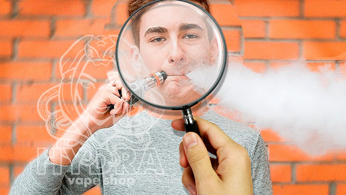 людина курить вейп